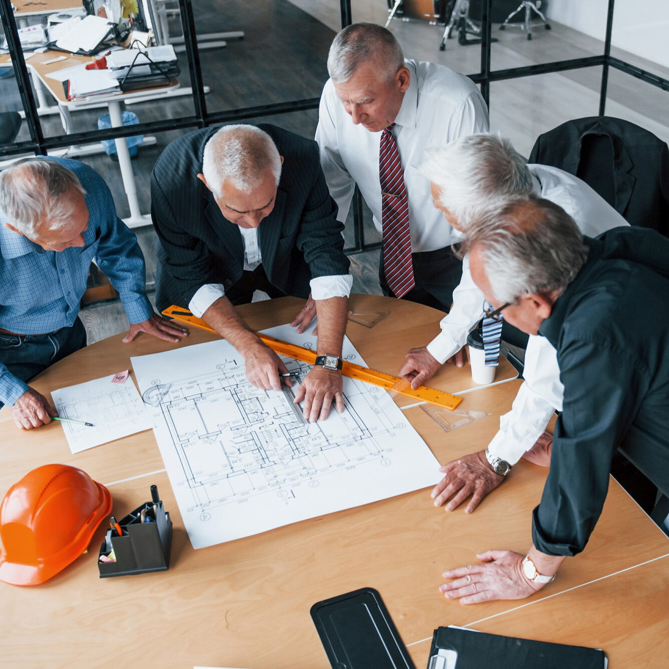 aged-team-elderly-businessman-architects-works-with-plan-office
